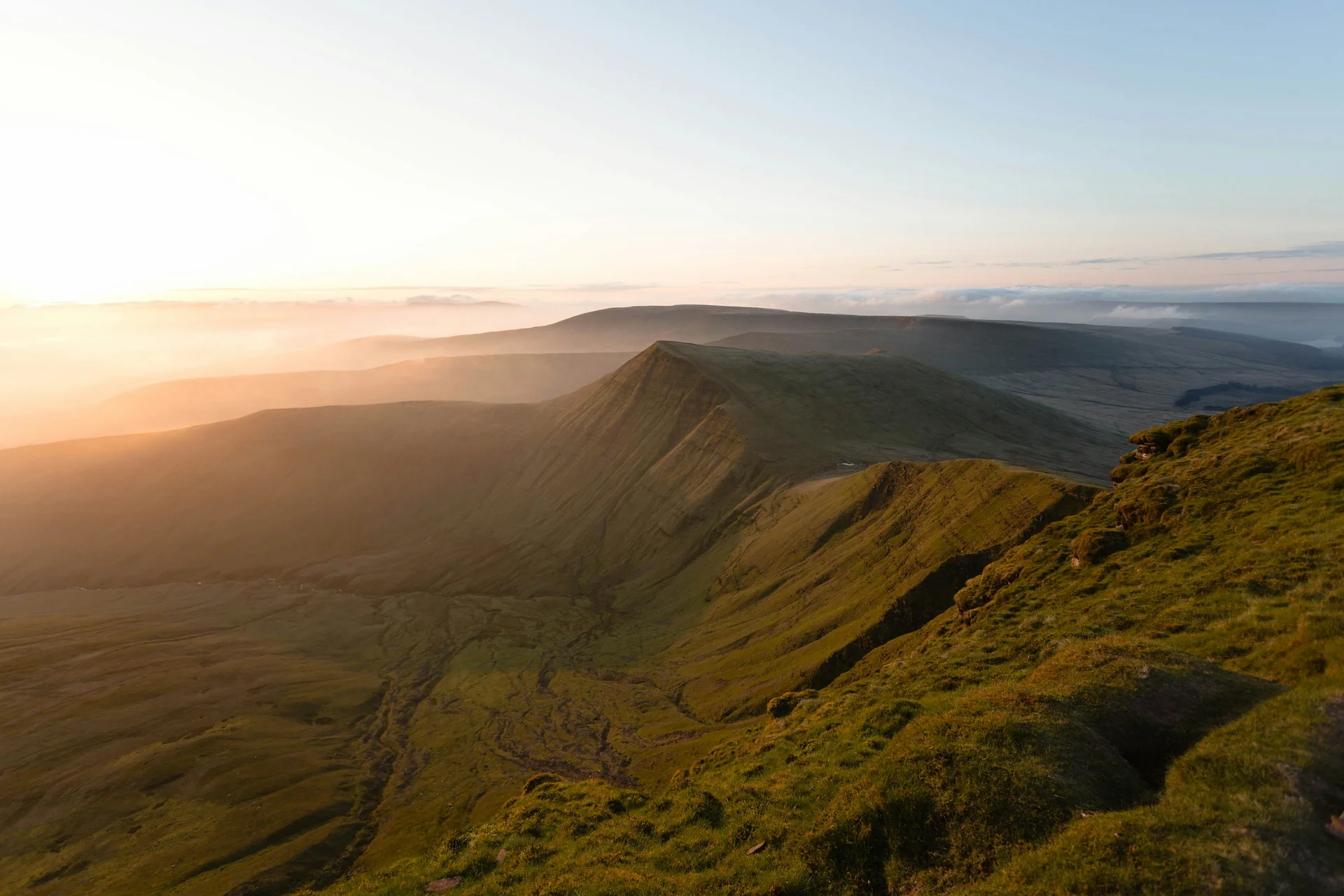 Golden-hour light along the Pen y Fan ridge