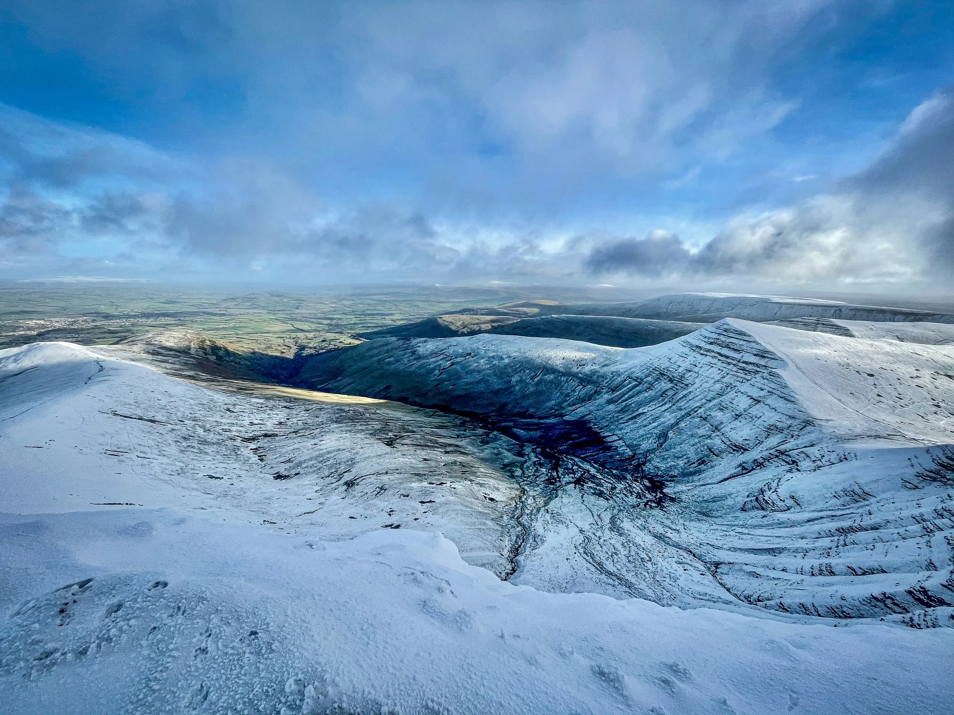 Snow-dusted high ridge of the Pen y Fan Horseshoe