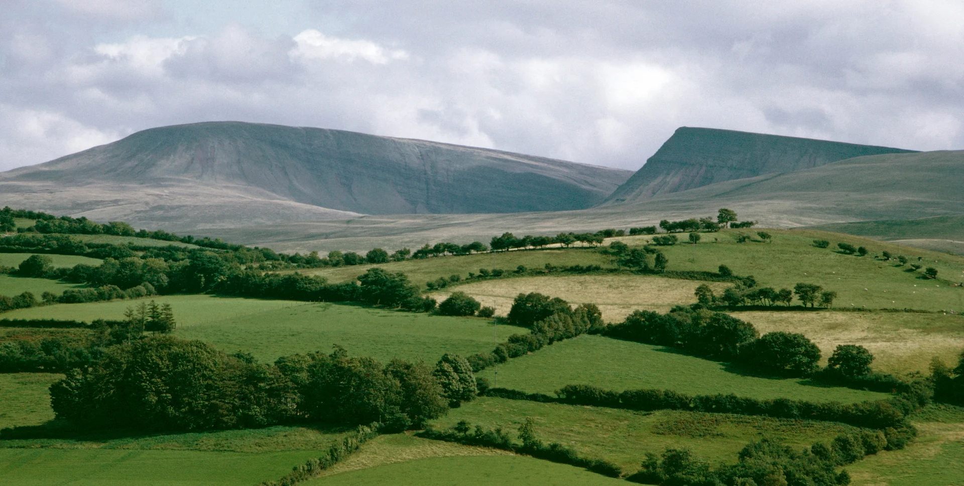 Pen y Fan seen as a distant silhouette from near Brecon